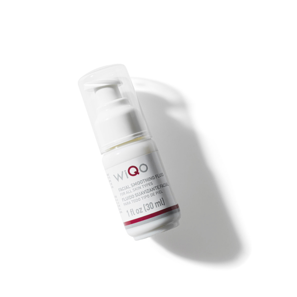 A bottle of WiQo's facial smoothing fluid for all skin types