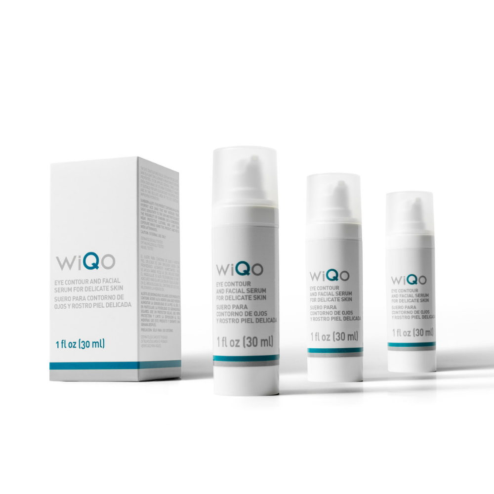 Multiple bottles and a box of WiQo's eye contour and facial serum for delicate skin