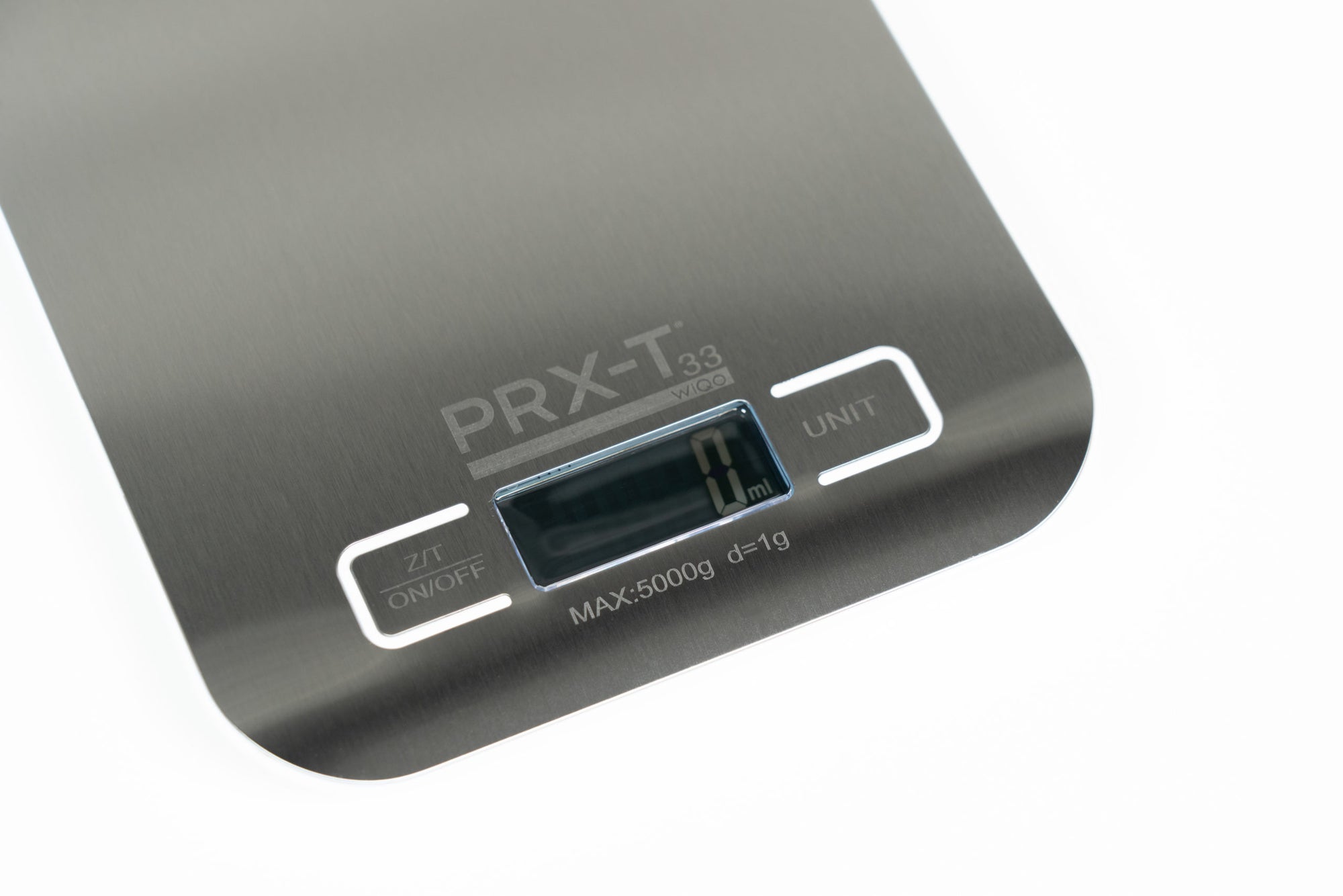 A close-up of a compact digital scale with the PRX Derm Perfexion logo